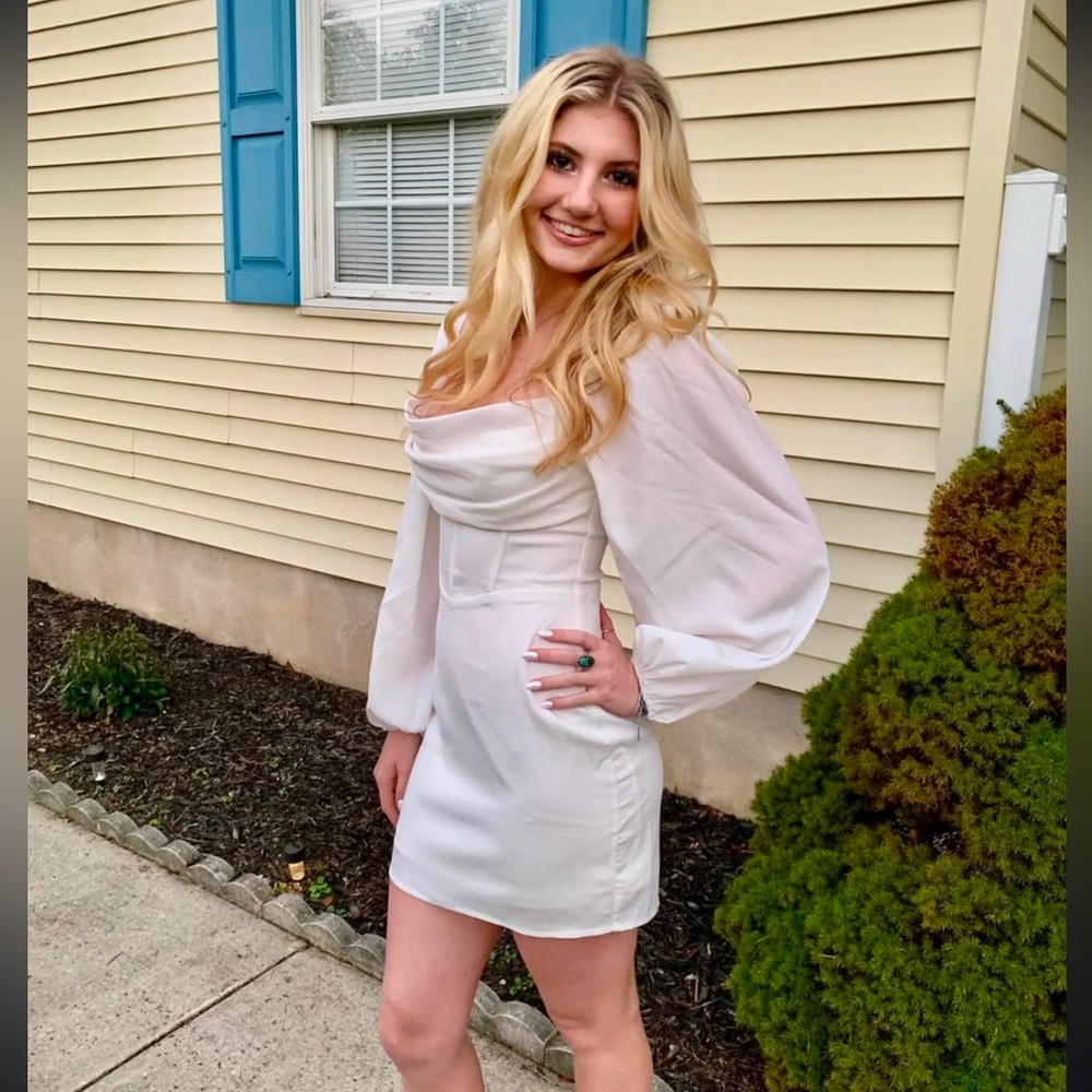 White mini dress with puffy sleeves form princess poly worn once to homecoming